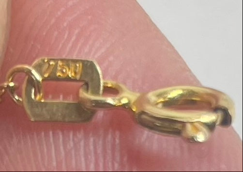 Damarmband i 18 karats guld med turkos fjärilsdesign, 18,5 cm långt, vikt 1,75 gram.