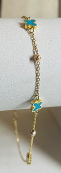 Damarmband i 18 karats guld med turkos fjärilsdesign, 18,5 cm långt, vikt 1,75 gram.