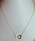 Halsband med två sammankopplade spännen, 18 karat guld, 46 cm långt, väger 1,9 gram